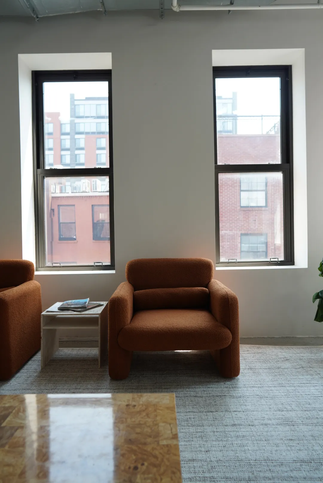 Rust-Colored Bouclé Armchairs
